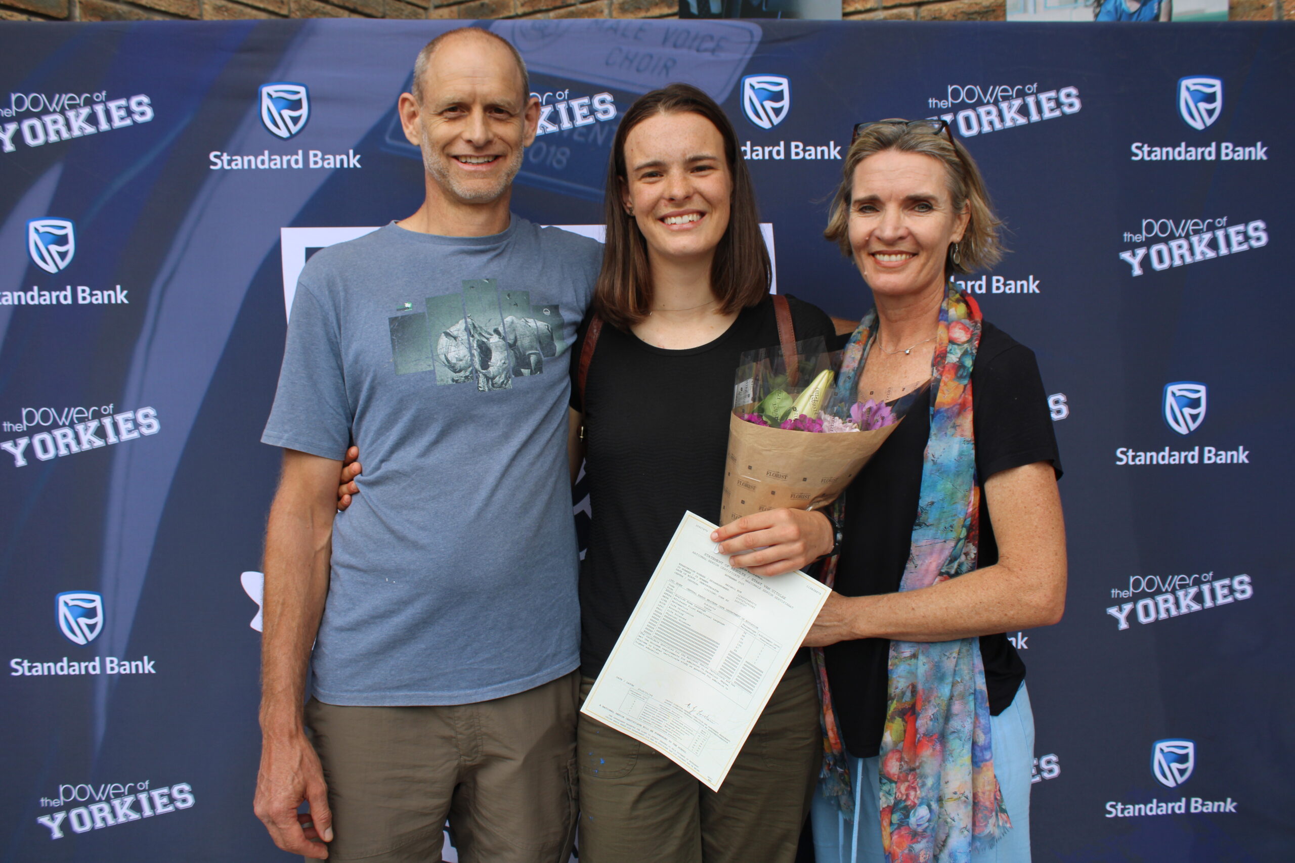 Proud parents Albert and Susi Kok with Abigail (middle). Photo: Michelle Pienaar, George Herald Abigail Kok, top matriculant
