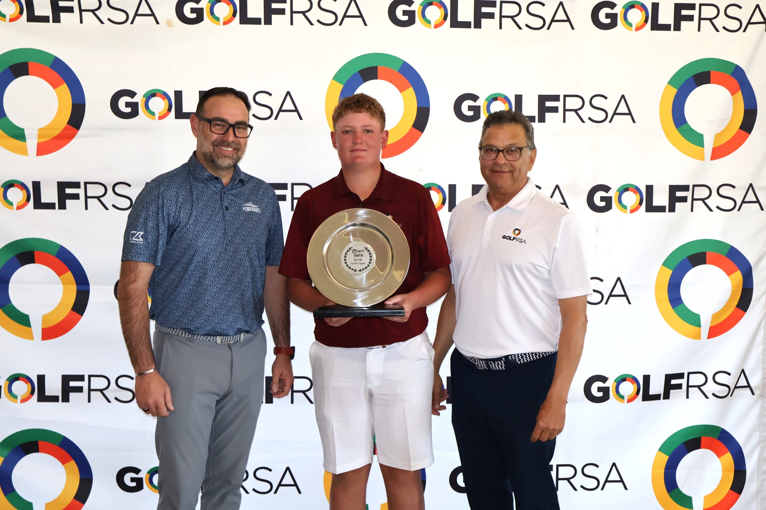 Jordan Groenewald U19 NTT Data Junior Open champion with Dean le Vieux of Kingswood (left) and Greg DeDoncker of GolfRSA (right). Photo: Beatrice Esterhuysen Jordan Groenewald U19 NTT Data Junior Open champion with Dean le Vieux of Kingswood and Greg DeDoncker of GolfRSA